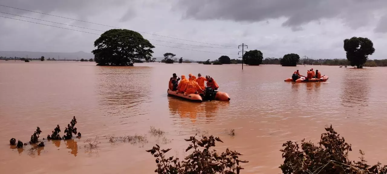 Vadodara NDRF troopers helped evacuate people from two flood-hit villages in Maharashtra