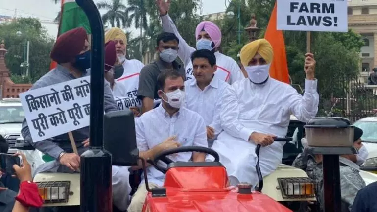Rahul Gandhi reaches Parliament on tractor in protest against farm laws