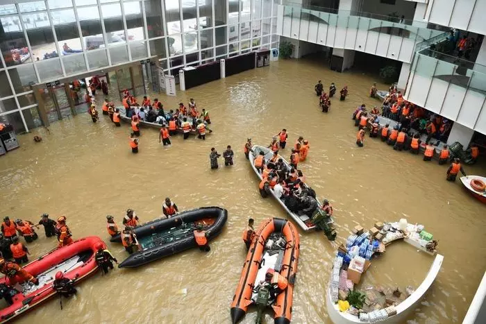 Death toll from Chinas Henan floods jumps to 302, up from 99 last week