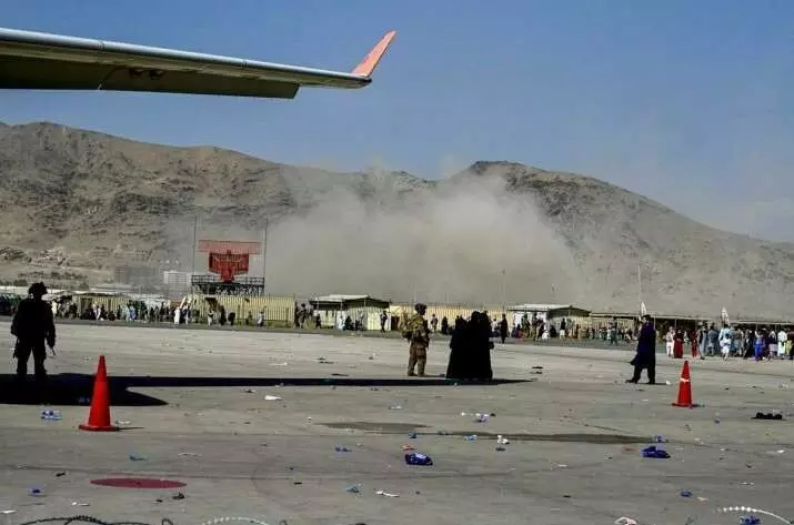 At least 60 civilians and 13 US troops killed in suicide attacks outside Kabul airport in Afghanistan