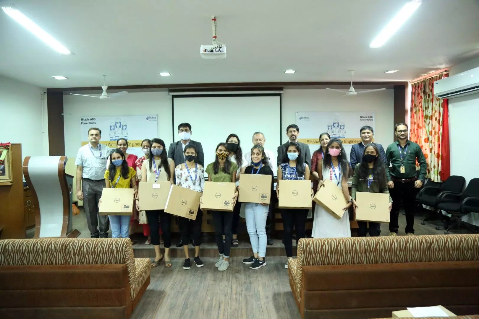 Parul Universitys girl student engineers receive scholarships and laptops under the Women in Engineering program