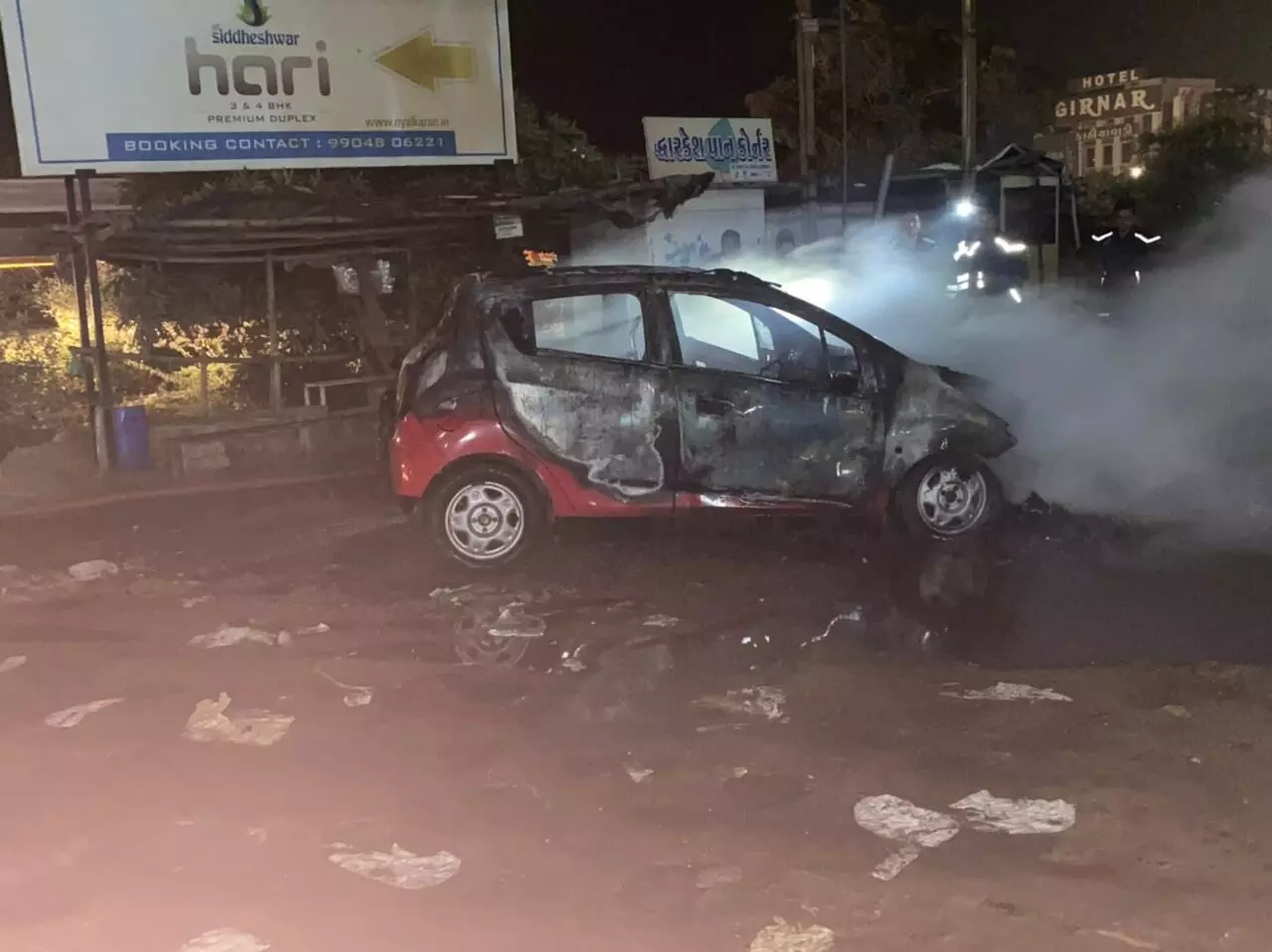 A couple and their son had a close shave after their car went on fire near Tarsali Bypass bridge