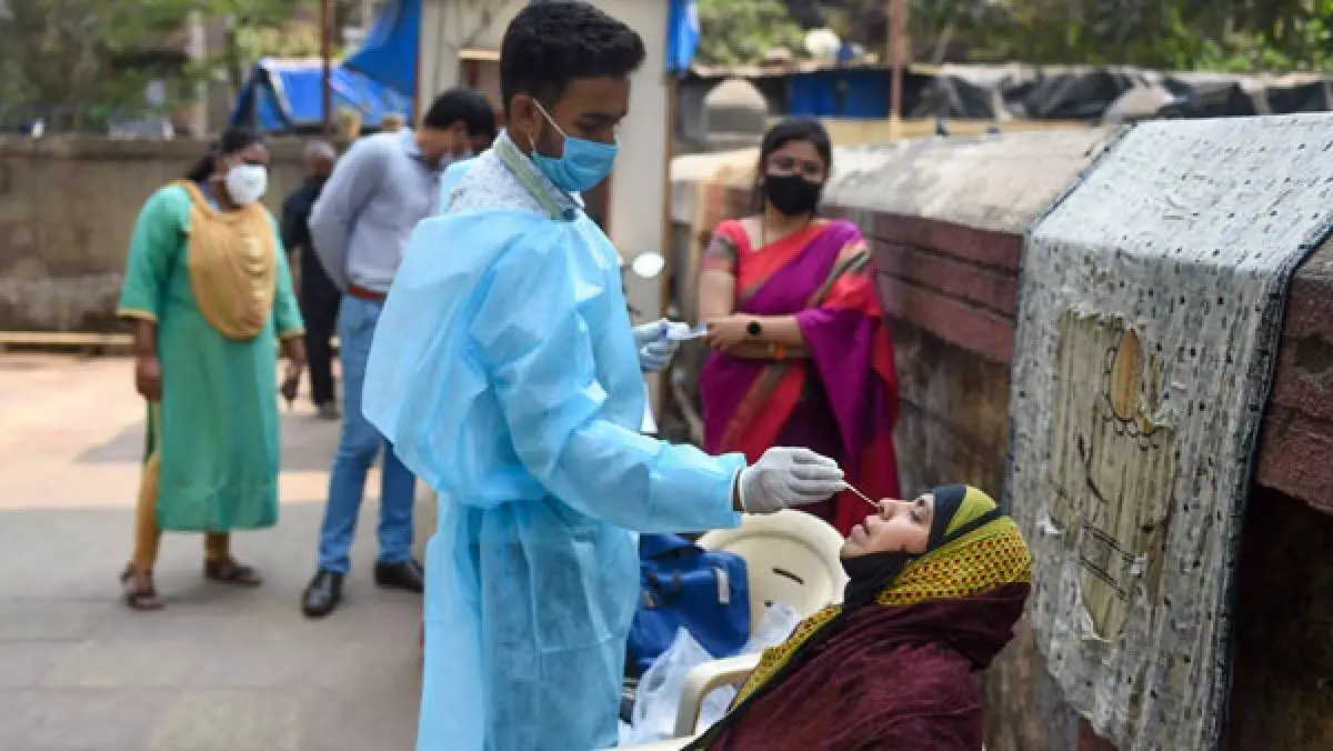India records 33,750 new COVID cases, Omicron infections reach 1,700