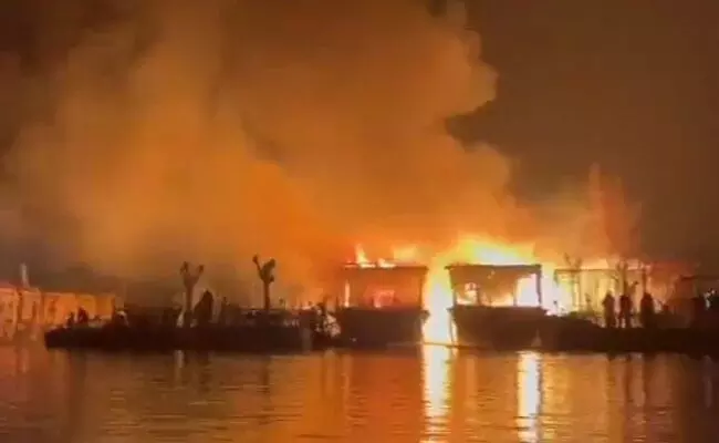 Two houseboats in Srinagars Dal Lake were destroyed by fire