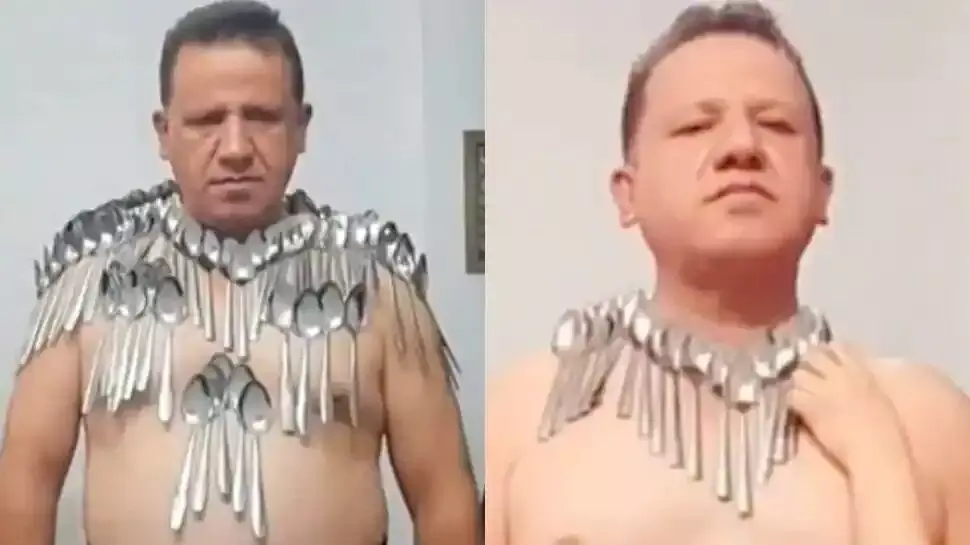 An Iranian man sets a new Guinness World Record by balancing 85 spoons on his torso