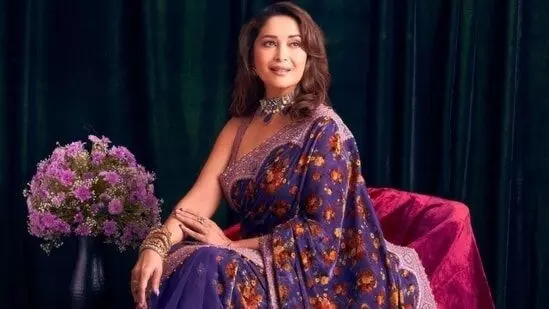 Madhuri Dixit in a 1 lakh jamuni velvet saree proving her the most beautiful woman on the planet