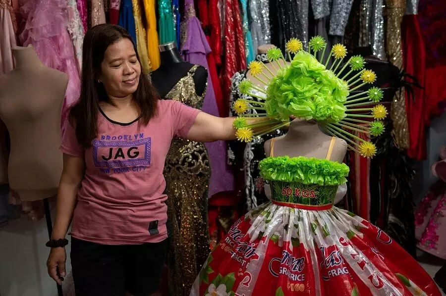 Philippine designer fashions gowns out of recycled trash
