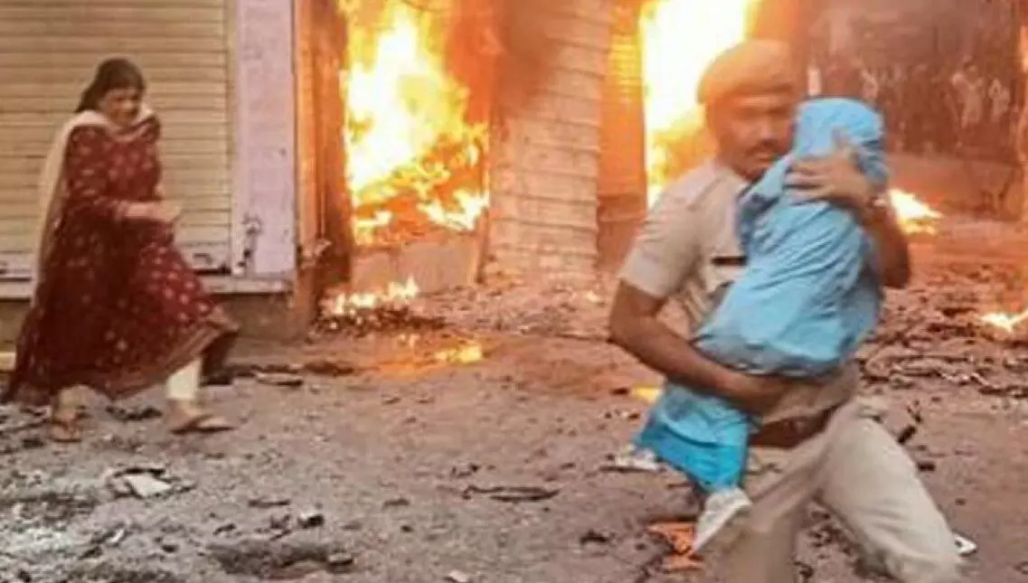 Cop who saved child during Karauli communal clash hailed as hero