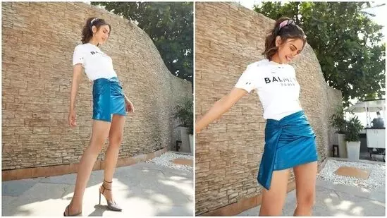 Rakul Preets white t-shirt, short metallic blue skirt is summer fashion goals