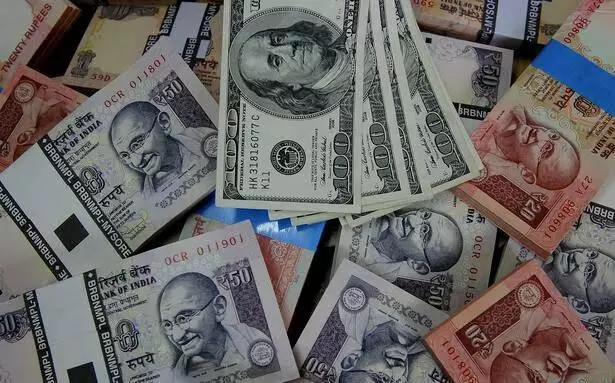 Rupee rises 12 paise to close at 79.57 against US dollar