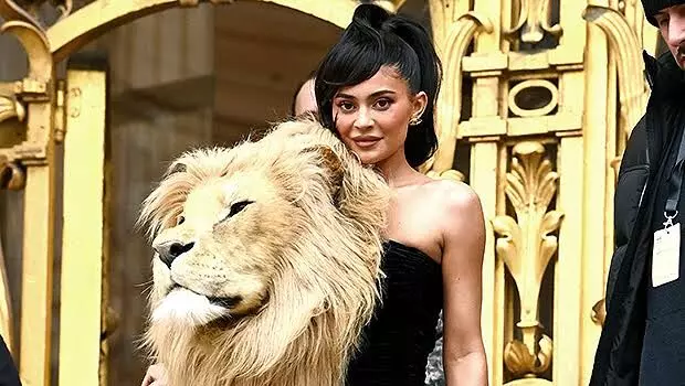 Kylie Jenner wears huge lion head gown to Paris fashion week