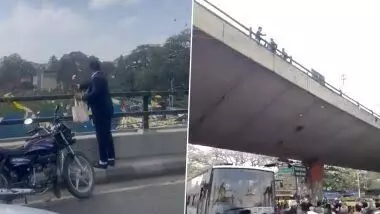 It’s raining money in Bengaluru: Man throws bank notes off flyover