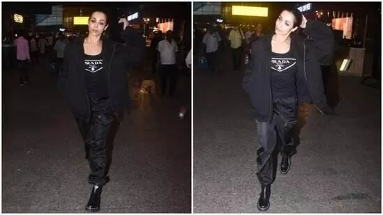 Malaika Arora channels fierce vibes in all-black tank top, pants and oversized jacket to slay airport fashion