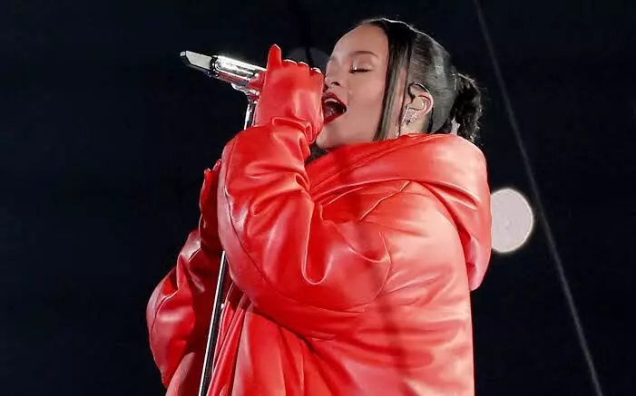 Rihanna’s all-red ensemble at Super Bowl 2023 paid tribute to fashion icon André Leon Talley