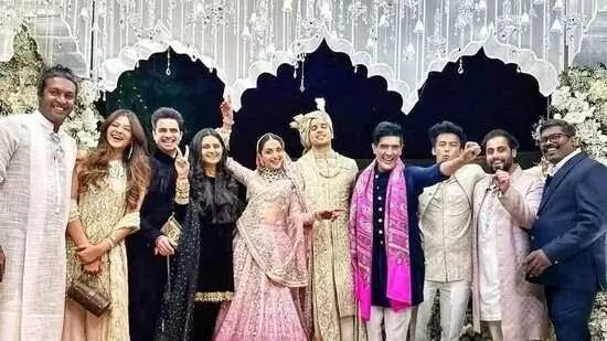 Sidharth Malhotra, Kiara Advani cant stop smiling in unseen wedding pics as they pose with Manish Malhotra