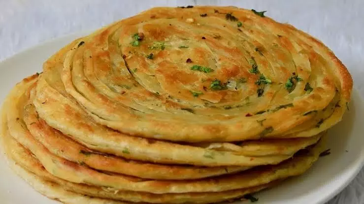 Chilli Garlic Paratha Recipe: If you like to try out new and unique recipes at home, then make sure you bookmark this recipe right away