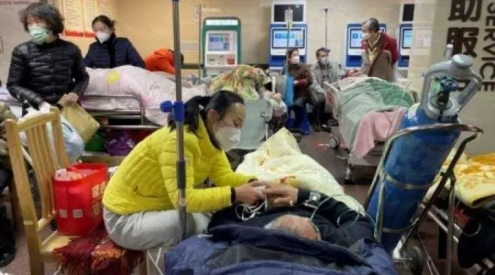China plans random, spot checks at hospitals to track COVID
