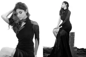 Mouni Roy mesmerises fans with her glamours look in a black off-shoulder gown
