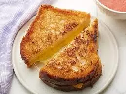 Cheddar Cheese Crust Sandwich Recipe:This sandwich would be your favourite on-the-go breakfast