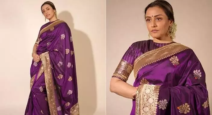 Namrata Shirodkar in a majestic purple Manish Malhotra silk saree