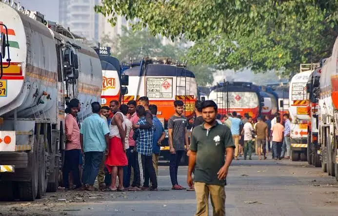 Truck drivers strike against new hit-and-run rule, causing long queues on petrol pumps