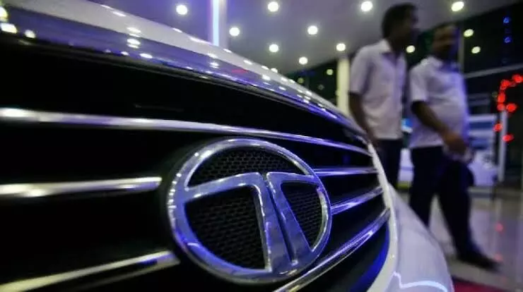 Tata Motors shares slip from record high as CLSA downgrades stock to outperform