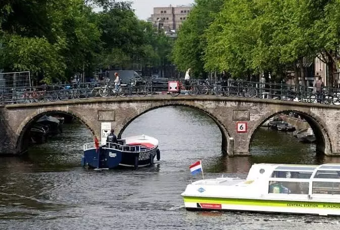Amsterdam bans construction of new hotels and slashes river cruise stays amid over tourism effects