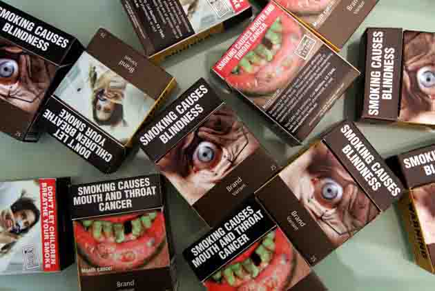 Display of health warning on tobacco packets reduced to 50%