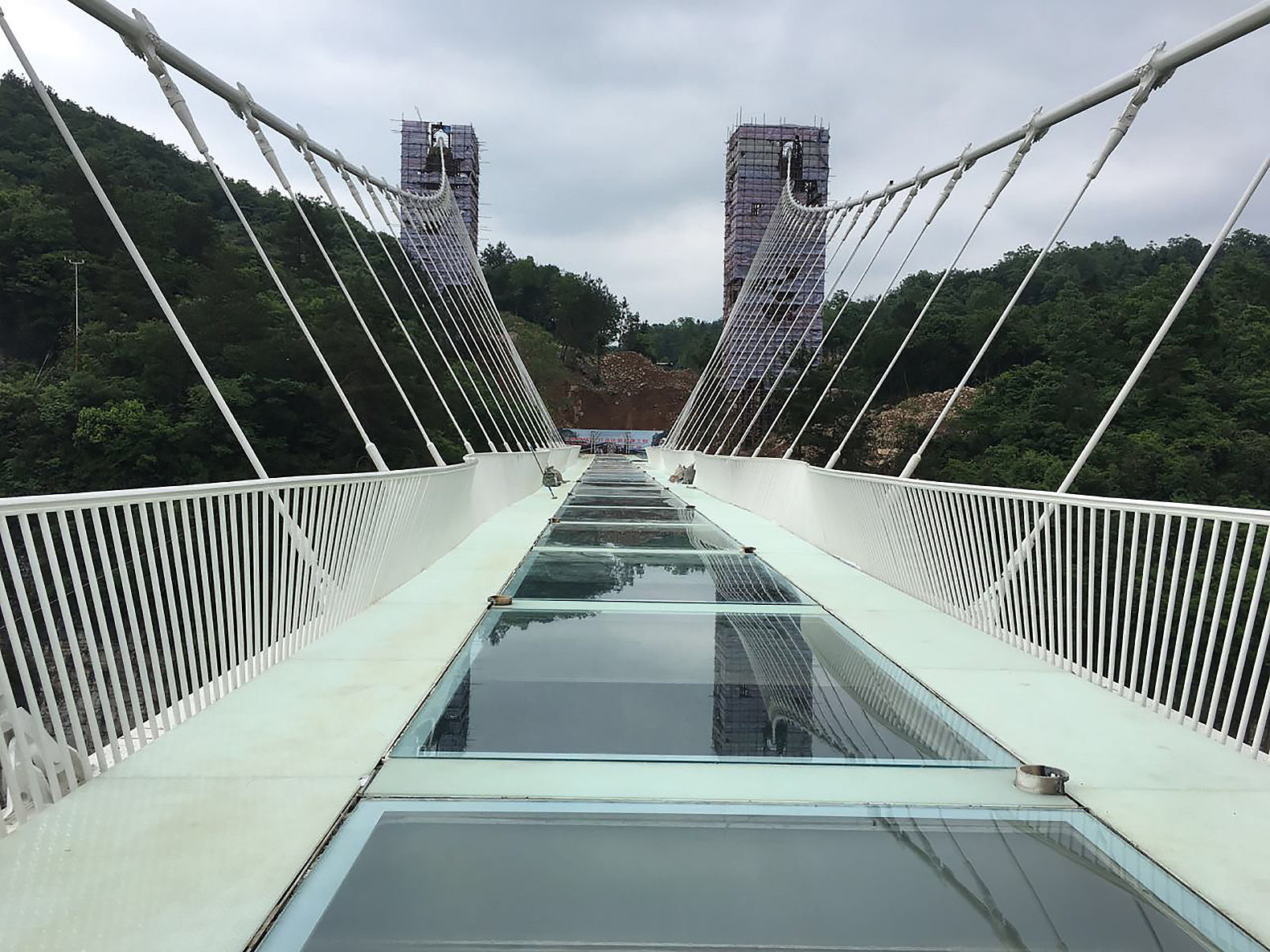 China opens World’s longest, highest glass bridge