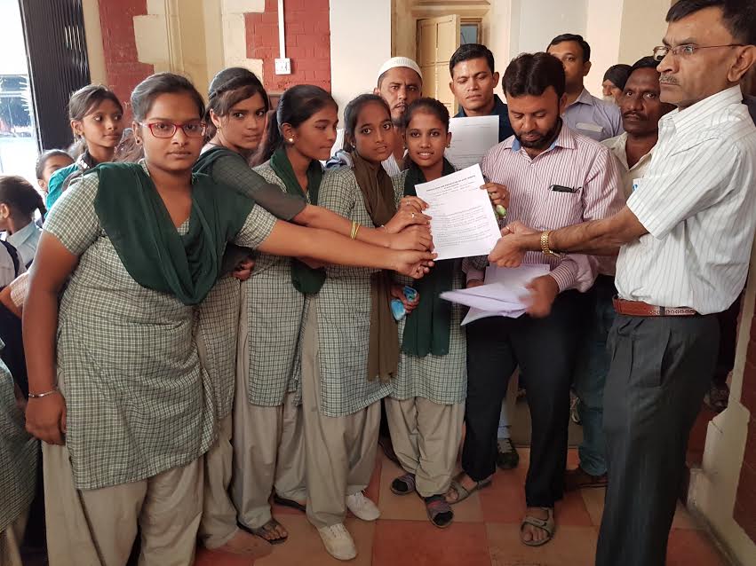 Students demand the collector not to demolish their homes and studies