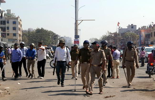 Police officer injured in Surat mob attack