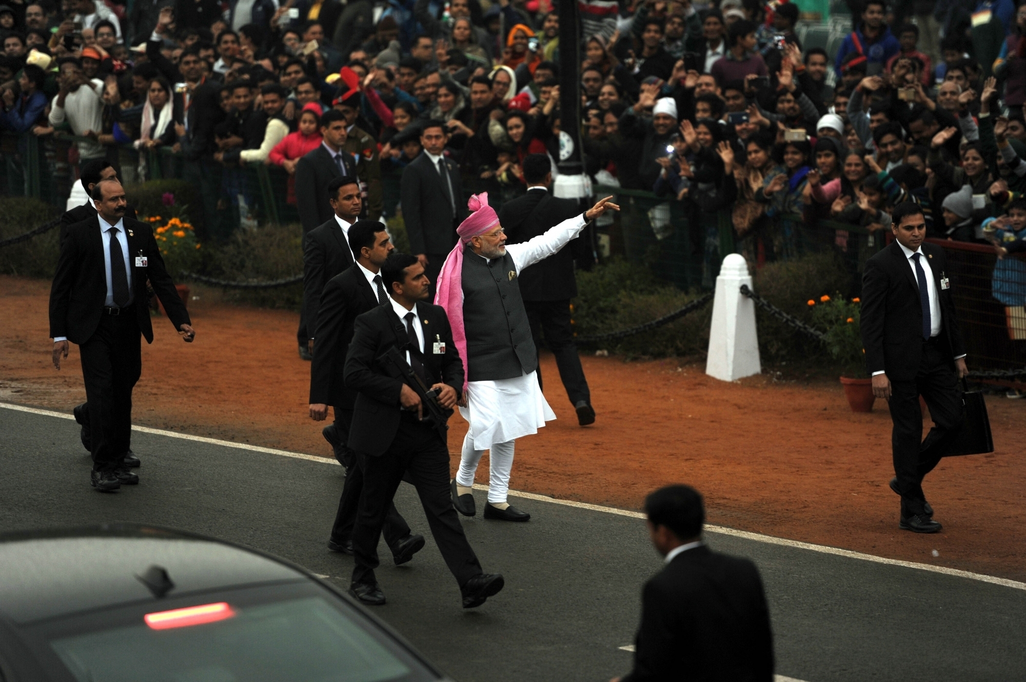 Modi walks on Rajpath, waves to crowd