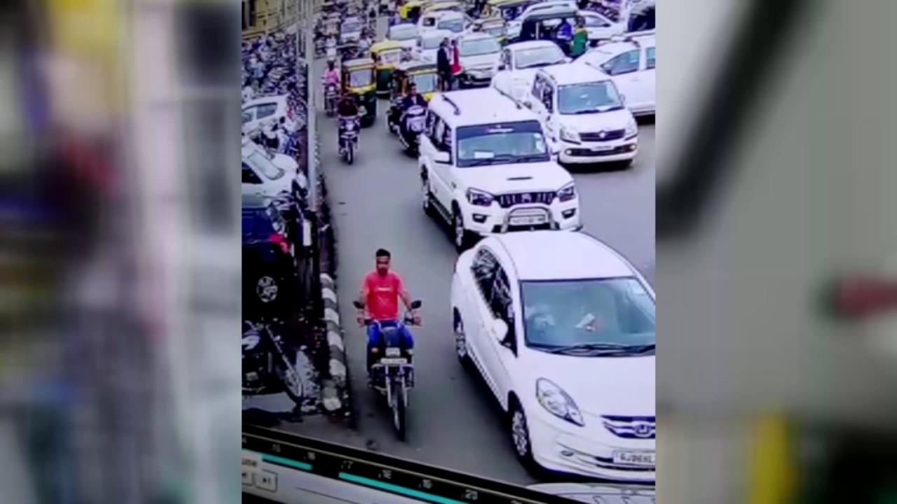 Vehicle theft captured in CCTV lifting the bike from parking