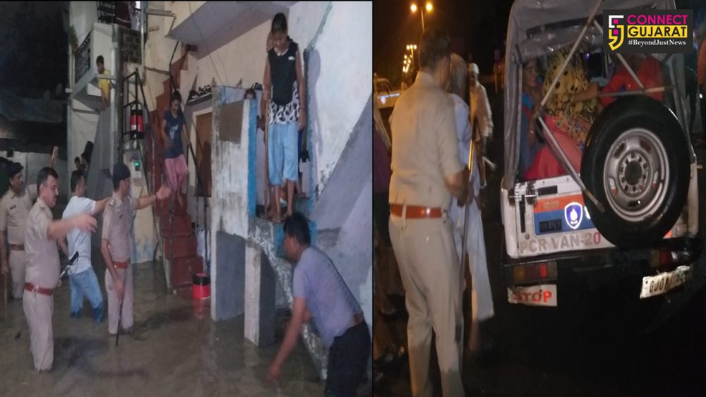 Vadodara police came to rescue of people stuck in rain waters