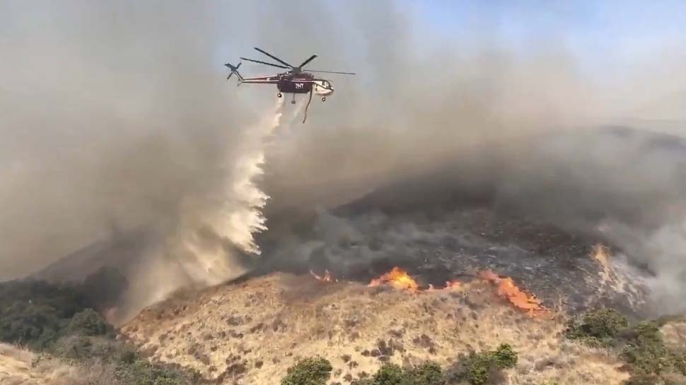 Southern California endures second straight day of wind-stoked wildfires