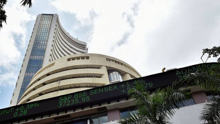 Nifty hits record high, Sensex above 42,000; metal stocks dip