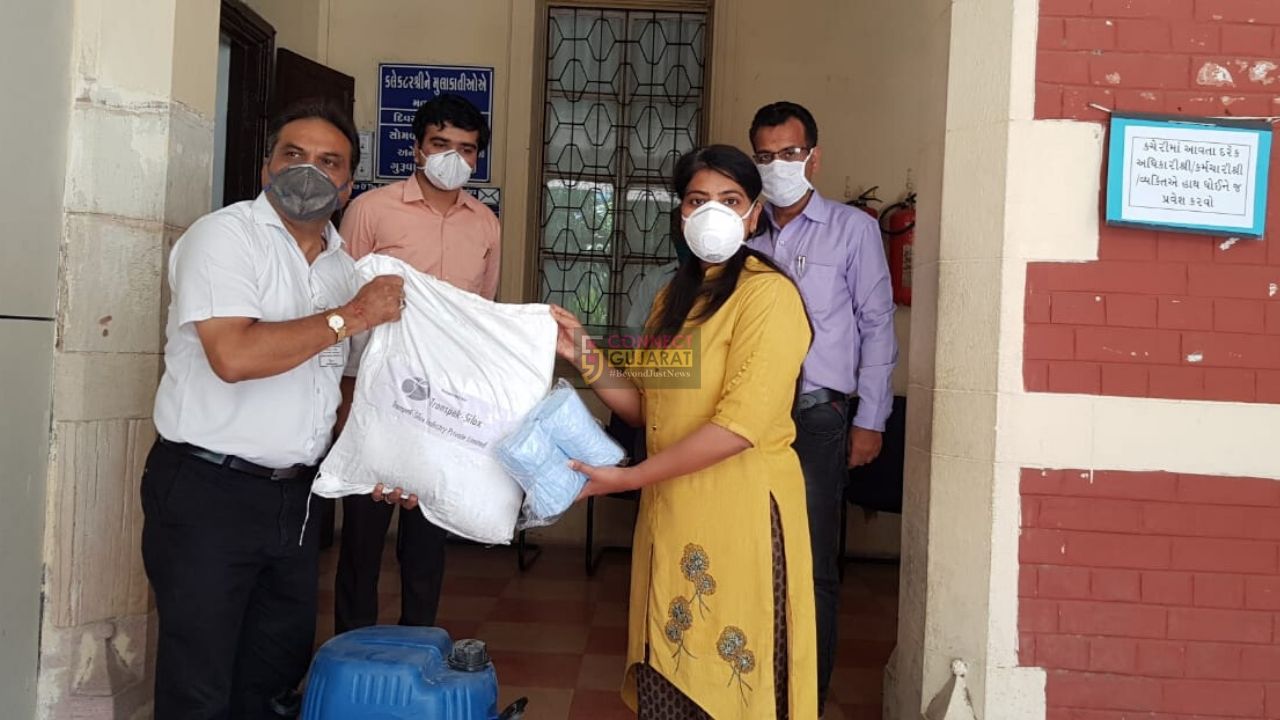 Transpek provides sanitizer masks and groceries kit to district collector
