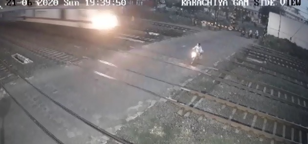 Bike rider tresspassed the closed gate knocked down by speeding train in Vadodara division