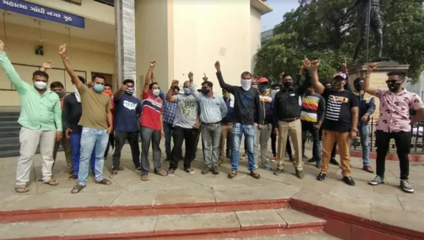 DJ Sound System and Light Operators staged protest at Gandhinagar Gruh