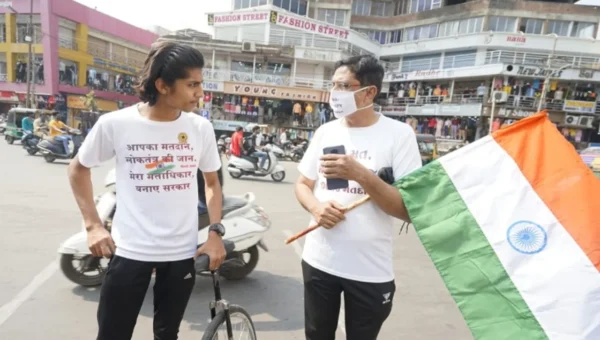 Youth spread unique voting message on his unicycle in Vadodara