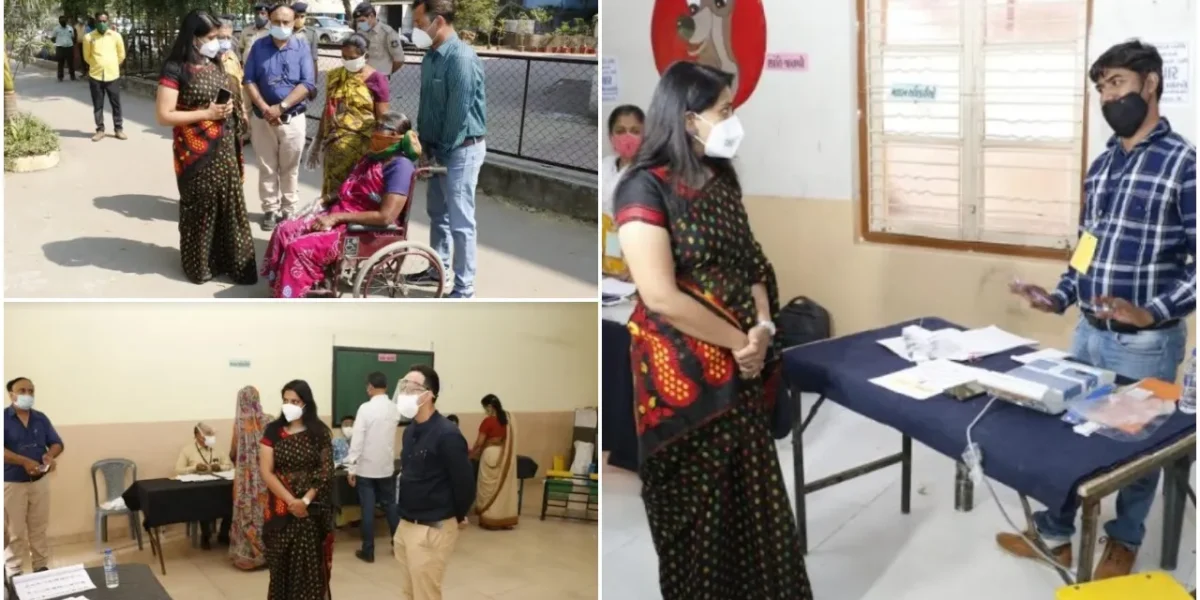 Vadodara city Election Officer Shalini Agarwal interact with blind woman voter Chandan Gohil