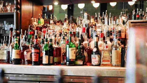 Delhi lowers legal age of drinking to 21, to close all government-run liquor shops