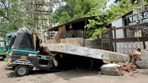 Vehicles and cabins damaged in wall collapse at corporation vehicle pool in Vadodara