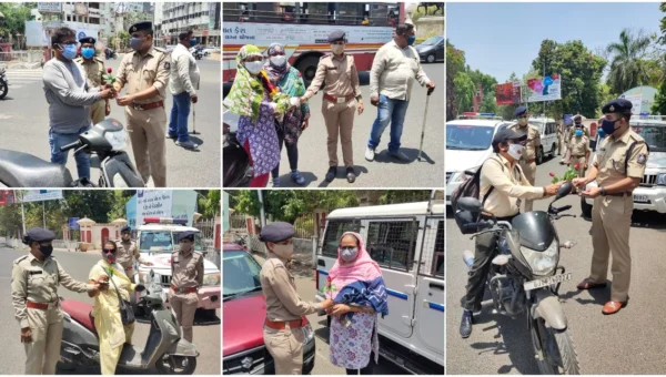 Vadodara police honoured people wearing double mask with a rose