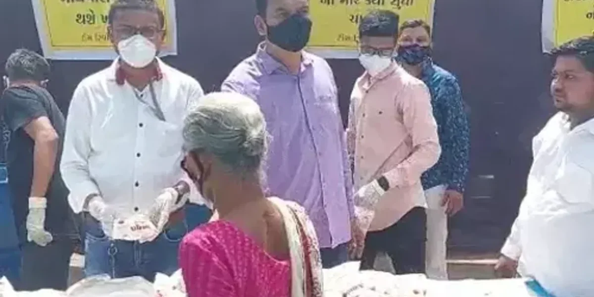 Unique protest against milk price hike by distributing 3000 bags of milk free of cost