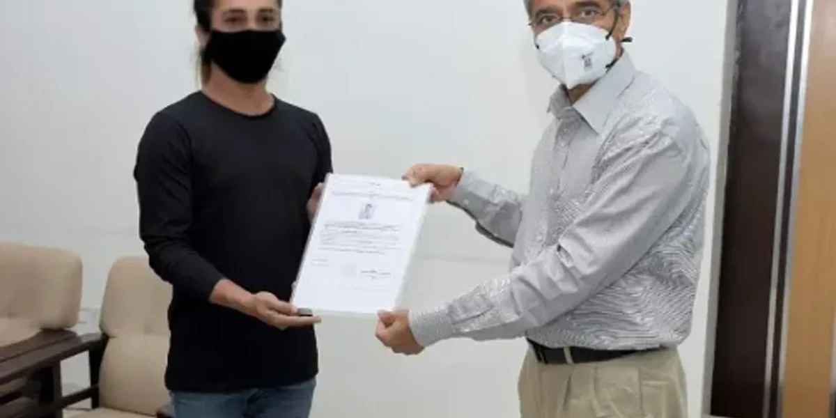 Vadodara Collector RB Barad handed identity cards to six Transgender people