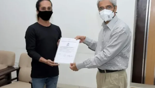 Vadodara Collector RB Barad handed identity cards to six Transgender people