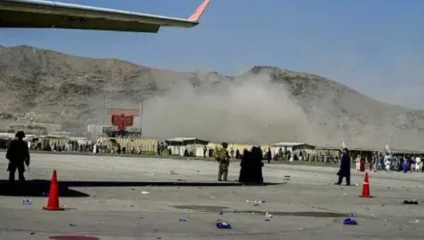 At least 60 civilians and 13 US troops killed in suicide attacks outside Kabul airport in Afghanistan