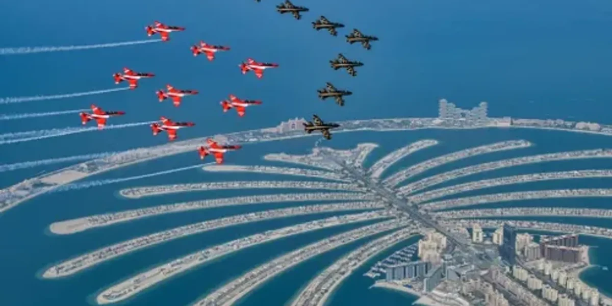 Indian Airforce Suryakiran Aerobatics Team and UAE’s Al Fursan Display Team fascinating flypast at Dubai Air Show 2021