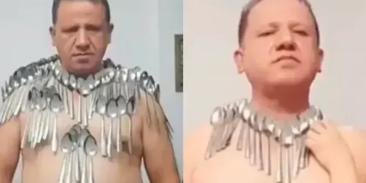 An Iranian man sets a new Guinness World Record by balancing 85 spoons on his torso